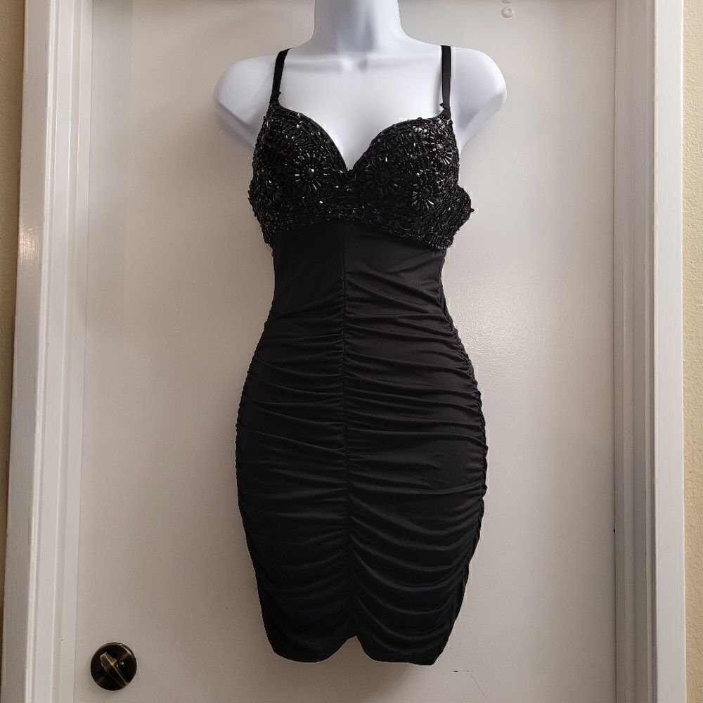 Easel Black Madonna style dress circa 90's with a beaded bra top.